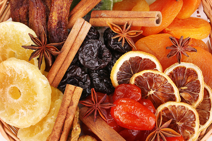 Dried fruits with cinnamon and anise stars close-up