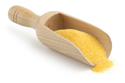 wooden scoop with cornmeal
